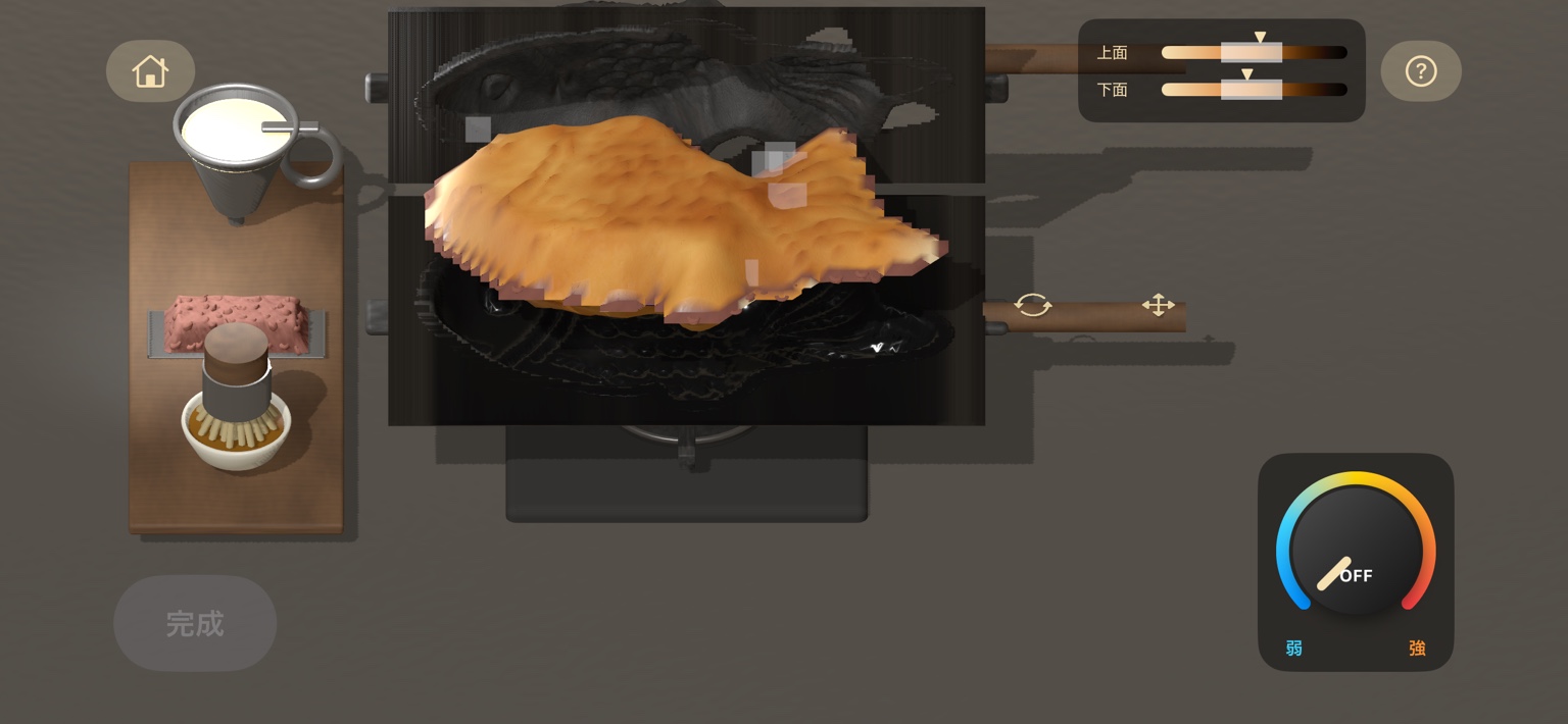 焼き上がったたい焼きを型から持ち上げた画面